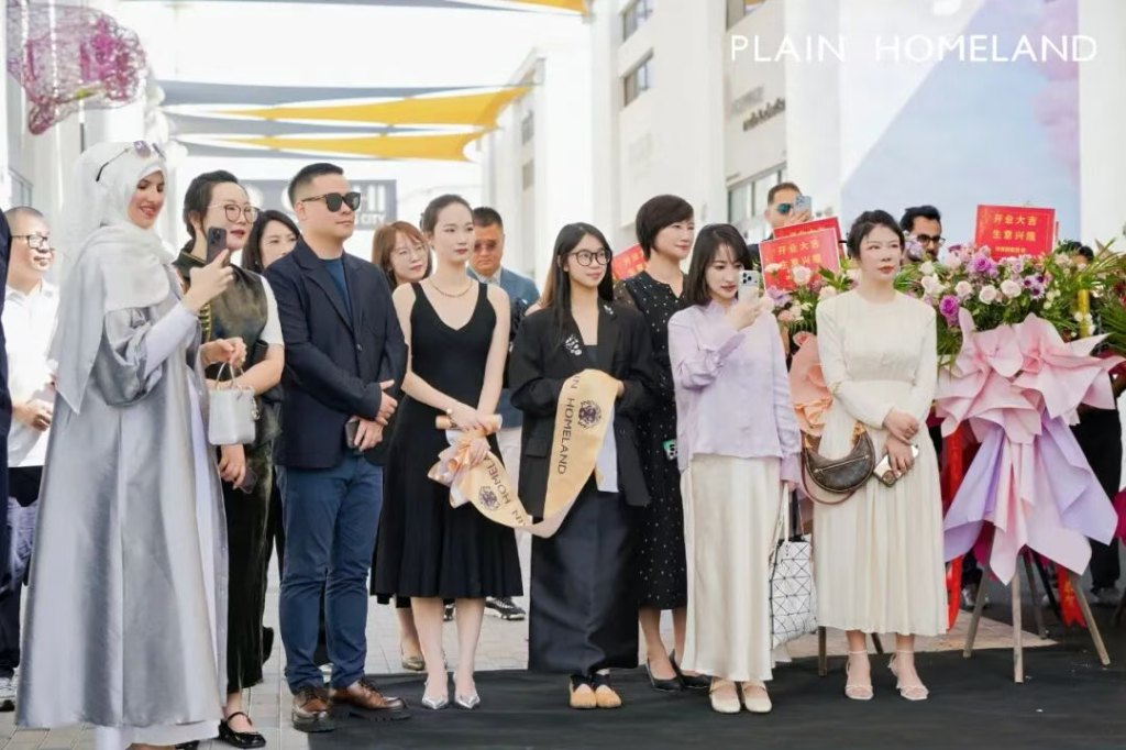 bystanders in front of dubai showroom