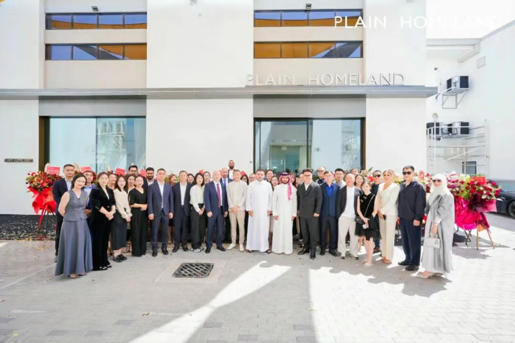 plain homeland dubai showroom group photo