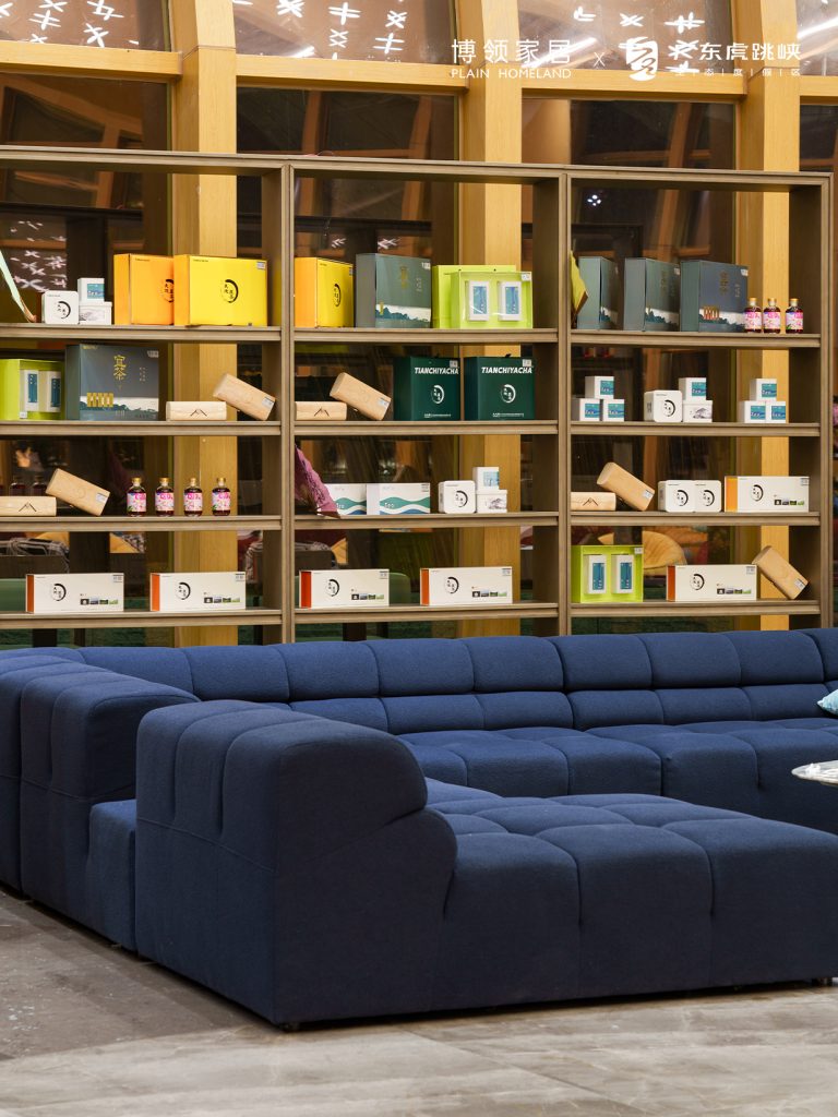 blue sofa become the relax place of the art space